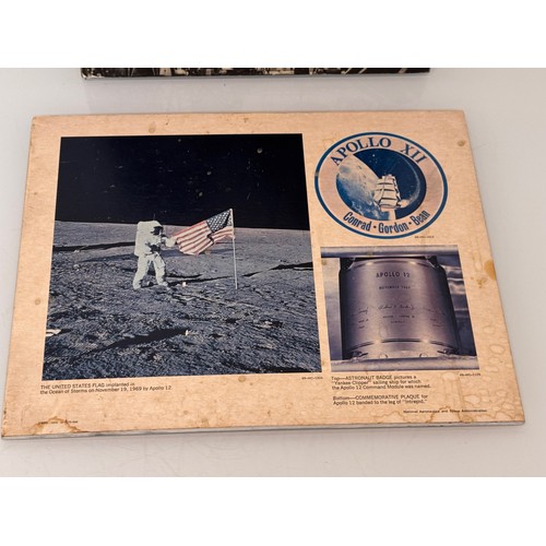 16 - Apollo moon landing exhibition photographs mounted on wooden panels, largest 38 cm tall.

This lot i... 