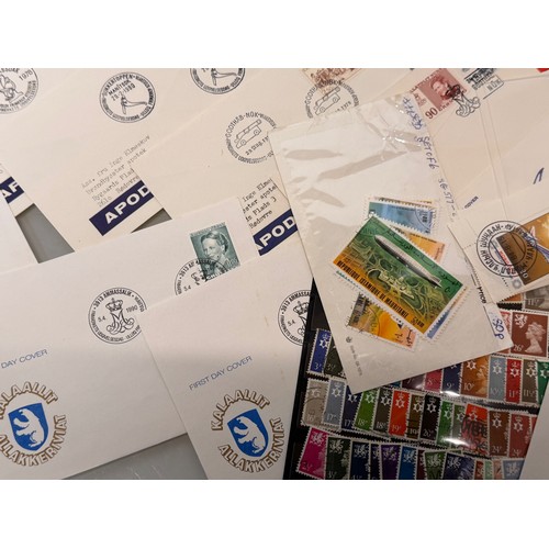 30 - Stamps a collection of GB and World stamps and a quantity of Greenland First Day Covers.

This lot i... 