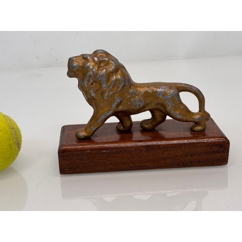 40 - Cast and enamel painted advertising figure of a lion for Peugeot.

This lot is available for in-hous... 