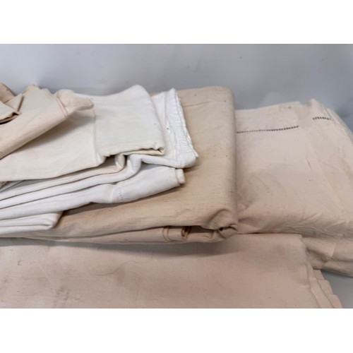 42 - Collection of six large vintage linen bed sheets.

This lot is available for in-house shipping.