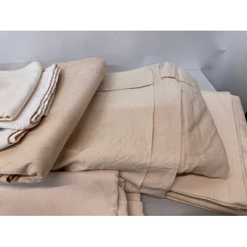 42 - Collection of six large vintage linen bed sheets.

This lot is available for in-house shipping.