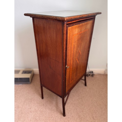 59 - Furniture, single door side cupboard with inlaid decoration. 57 cm x 37 cm x 90cm tall.

This lot is... 