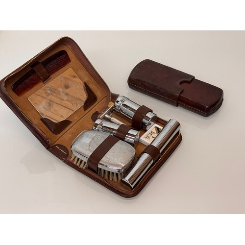 76 - Leather cased gentleman’s  travelling set and a leather cigar case.

This lot is available for in-ho... 