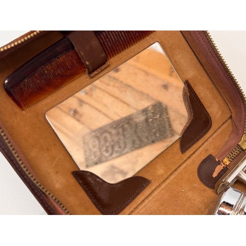 76 - Leather cased gentleman’s  travelling set and a leather cigar case.

This lot is available for in-ho... 