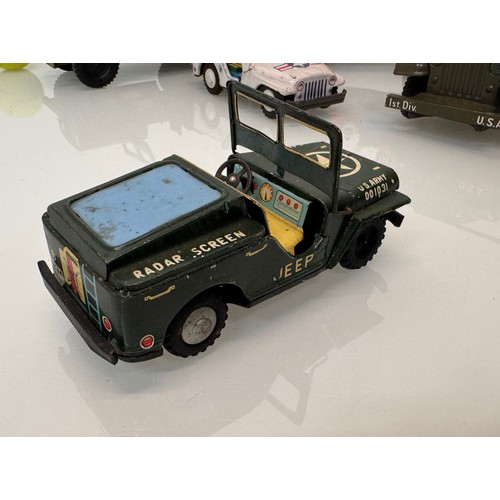 80 - Model military toys, Japanese tin plate and plastic classic Jeep .

This lot is available for in-hou... 