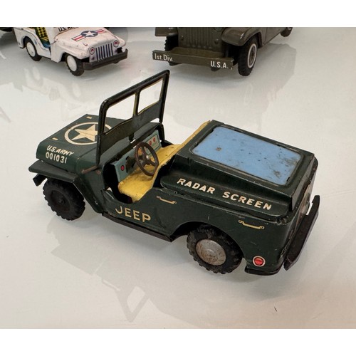 80 - Model military toys, Japanese tin plate and plastic classic Jeep .

This lot is available for in-hou... 