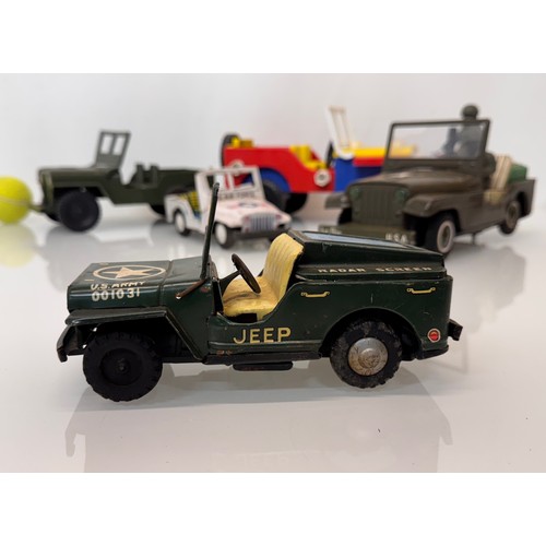 80 - Model military toys, Japanese tin plate and plastic classic Jeep .

This lot is available for in-hou... 