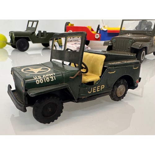 80 - Model military toys, Japanese tin plate and plastic classic Jeep .

This lot is available for in-hou... 