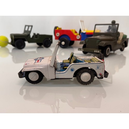 80 - Model military toys, Japanese tin plate and plastic classic Jeep .

This lot is available for in-hou... 