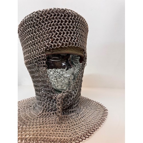 216 - Militaria, re-enactment uniforms, a chain-mail Crusaders style helmet.

This lot is available for in... 