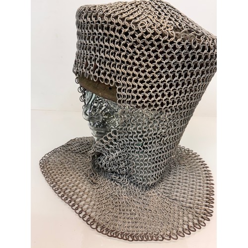 216 - Militaria, re-enactment uniforms, a chain-mail Crusaders style helmet.

This lot is available for in... 