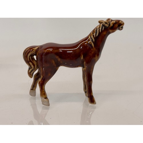 224 - Four Chinese ceramic horses.

This lot is available for in-house shipping.