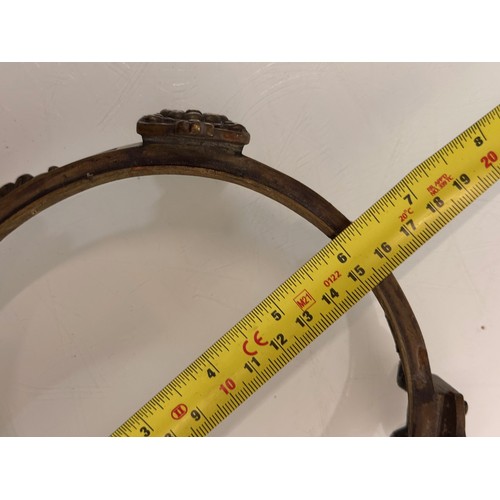 227 - Cast brass circular stand, 16 cm in diameter.

This lot is available for in-house shipping.