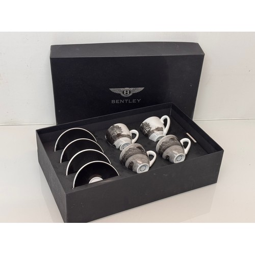 268 - Automobilia, Bentley motor cars official merchandise, a boxed set of coffee cups illustrated with 19... 