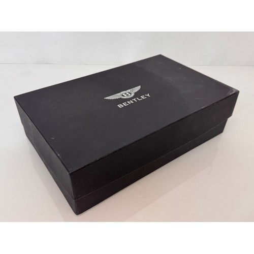 268 - Automobilia, Bentley motor cars official merchandise, a boxed set of coffee cups illustrated with 19... 