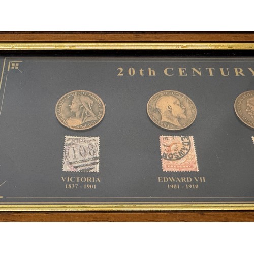 271 - Coins and Stamps, a commemorative framed group showning the English monarchs through the C20th centu... 