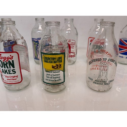 273 - Advertising wares, 1970’s glass milk bottles with a variety of advertising.

This lot is available f... 