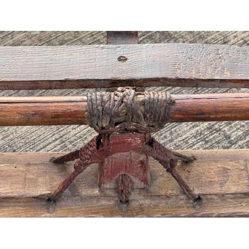 34 - Polar exploration, Winter Sports a large early C20th century Nansen Sledge with hide bindings 220 cm... 