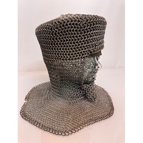 7 - Militaria, re-enactment uniforms, a chain-mail Crusaders style helmet.

This lot is available for in... 