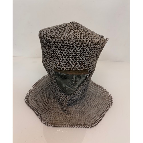 7 - Militaria, re-enactment uniforms, a chain-mail Crusaders style helmet.

This lot is available for in... 
