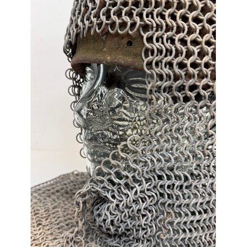 7 - Militaria, re-enactment uniforms, a chain-mail Crusaders style helmet.

This lot is available for in... 