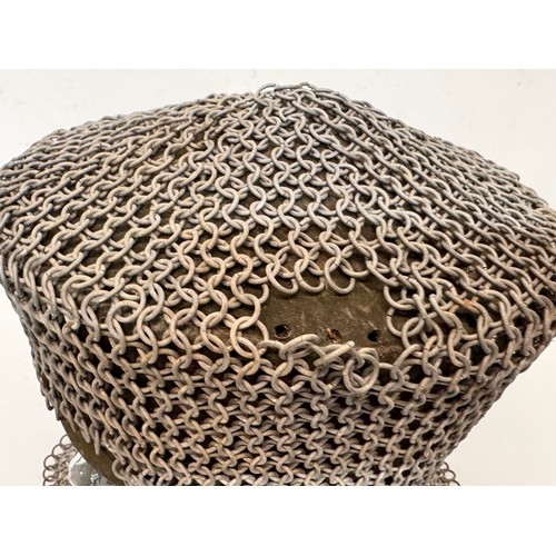 7 - Militaria, re-enactment uniforms, a chain-mail Crusaders style helmet.

This lot is available for in... 