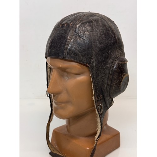 245 - WWII military clothing a Lufwaffe pilots hat German Airforce uniform.

This lot is available for in-... 