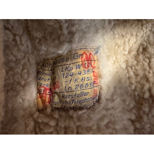 245 - WWII military clothing a Lufwaffe pilots hat German Airforce uniform.

This lot is available for in-... 