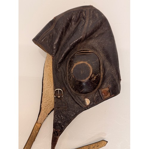 245 - WWII military clothing a Lufwaffe pilots hat German Airforce uniform.

This lot is available for in-... 