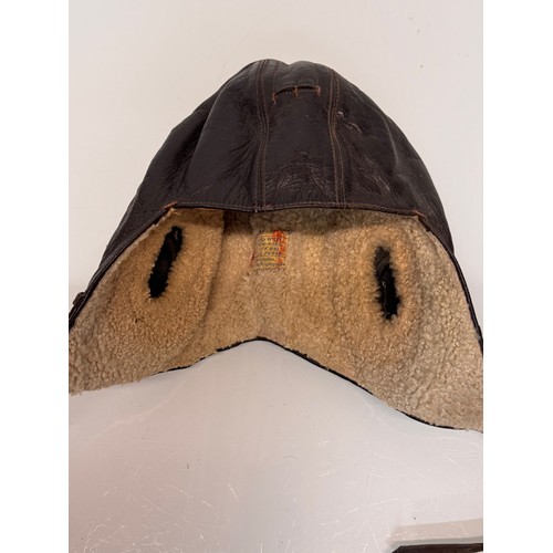 245 - WWII military clothing a Lufwaffe pilots hat German Airforce uniform.

This lot is available for in-... 