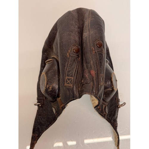 245 - WWII military clothing a Lufwaffe pilots hat German Airforce uniform.

This lot is available for in-... 