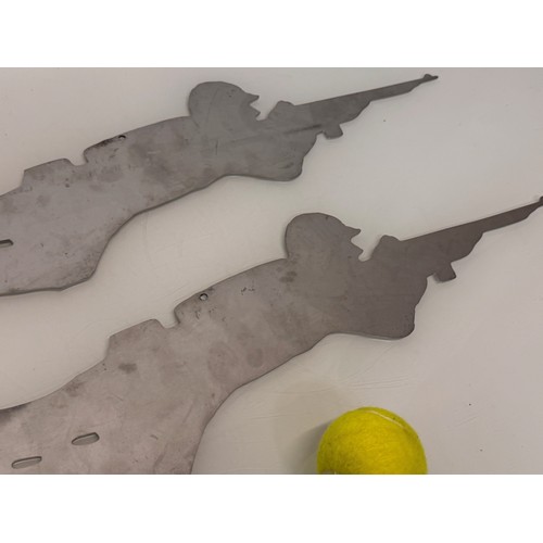 251 - Militaria, Pair of metal shooting range targets, 60 cm long.

This lot is available for in-house shi... 