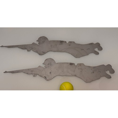 251 - Militaria, Pair of metal shooting range targets, 60 cm long.

This lot is available for in-house shi... 