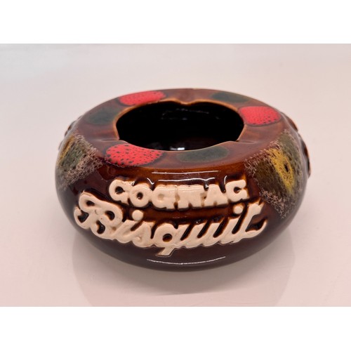 265 - Breweryana, a large mid-century Cognac Bisquit advertising ashtray by Ricard pottery. 18 cm diameter... 