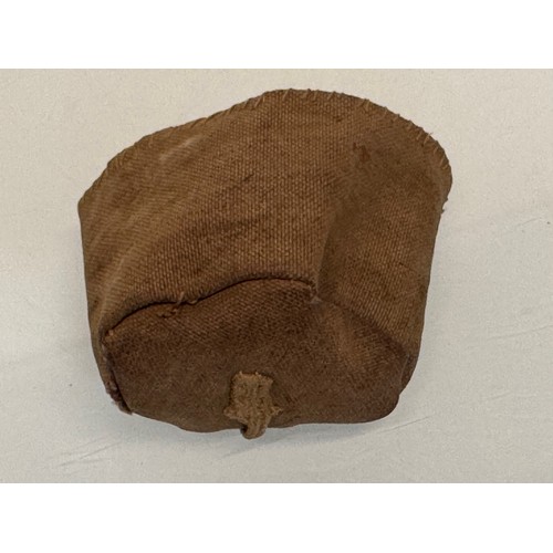 326 - Ethic art, toys and games, an Inuit made ball and hoop game in a small fabric bag.

This lot is avai... 