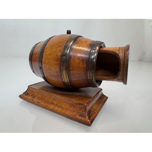 71 - Treen, Match box, in the form of a brass bound barrel on a plinth, sprung end opens for access to th... 