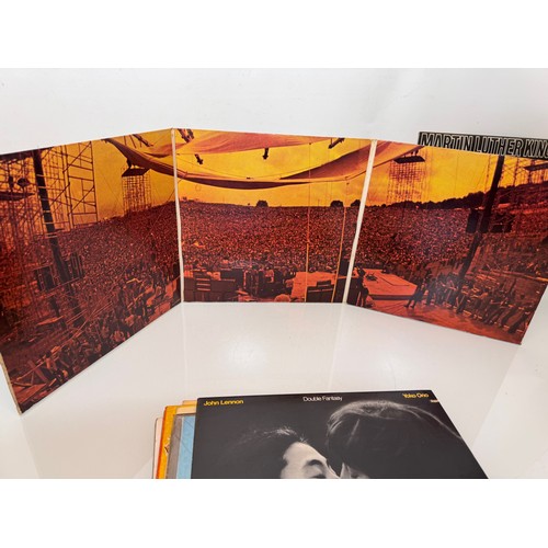 17 - Records, a small collection of vinyl LP's, John Lennon, Woodstock, Martin Luther King, Clockwork Ora... 