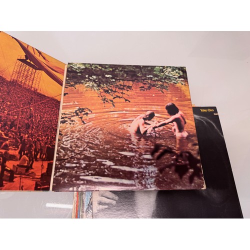 17 - Records, a small collection of vinyl LP's, John Lennon, Woodstock, Martin Luther King, Clockwork Ora... 