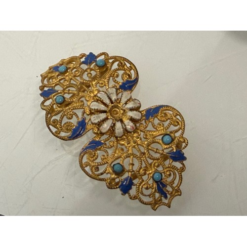 36 - A collection of buckles, silver and enamelled examples and a some linked coins.

This lot is availab... 