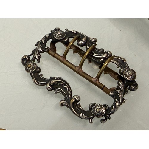 36 - A collection of buckles, silver and enamelled examples and a some linked coins.

This lot is availab... 