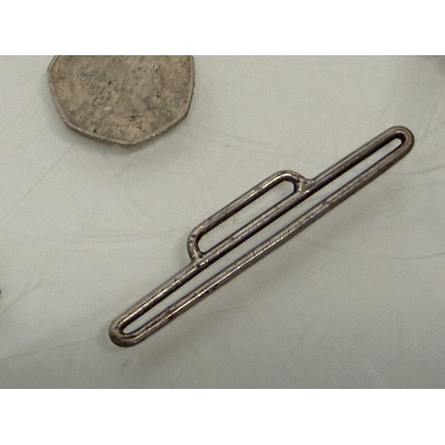 36 - A collection of buckles, silver and enamelled examples and a some linked coins.

This lot is availab... 