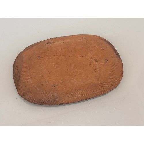 38 - English slip ware dish, illustrated with a fish, 29 cm wide.

This lot is available for in-house shi... 