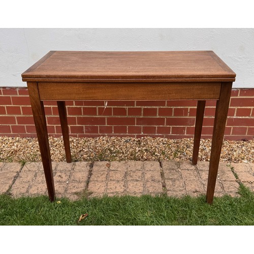 42 - Unusual mid century teak furniture, a table with a rotating folding top and hidden storage compartme... 