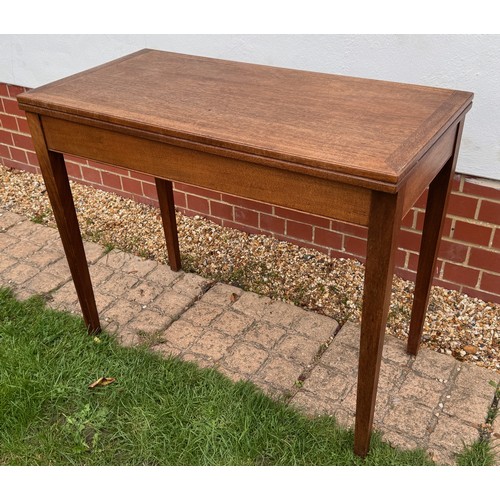 42 - Unusual mid century teak furniture, a table with a rotating folding top and hidden storage compartme... 