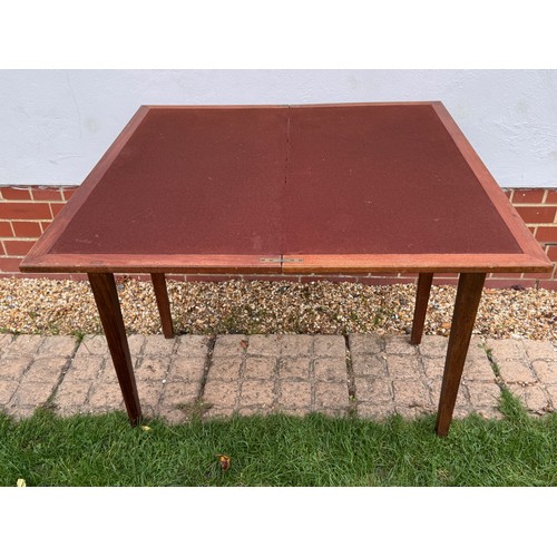 42 - Unusual mid century teak furniture, a table with a rotating folding top and hidden storage compartme... 