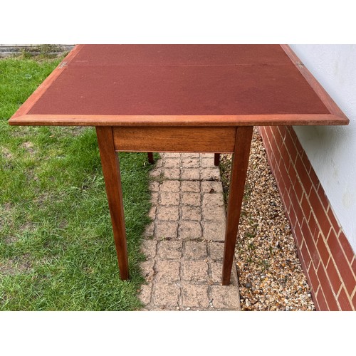 42 - Unusual mid century teak furniture, a table with a rotating folding top and hidden storage compartme... 