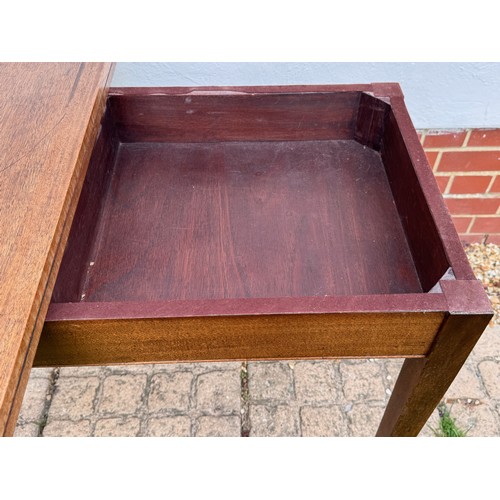 42 - Unusual mid century teak furniture, a table with a rotating folding top and hidden storage compartme... 