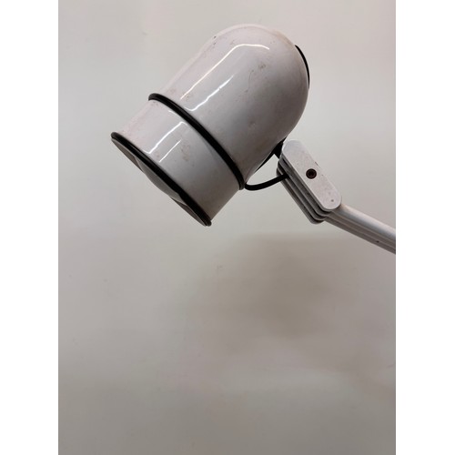 469 - Mid century italian desgner lighting, furnishings, a Cosmo branded desk lamp.

This lot is available... 