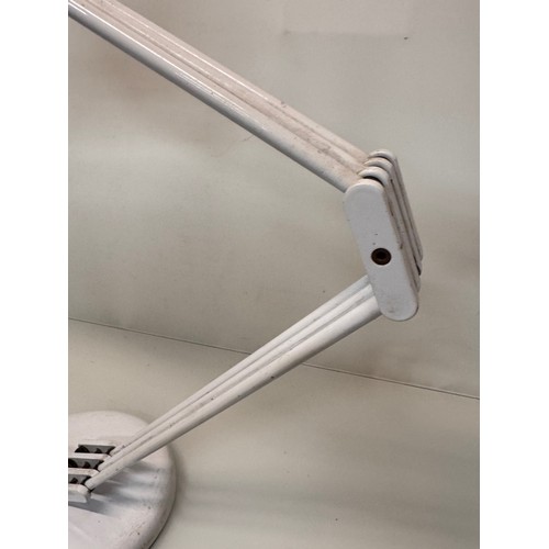 469 - Mid century italian desgner lighting, furnishings, a Cosmo branded desk lamp.

This lot is available... 