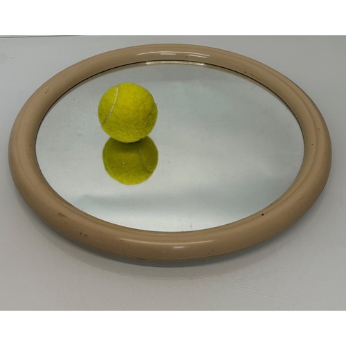 49 - Mid century furniture, a circular framed wall mirror.

This lot is available for in-house shipping